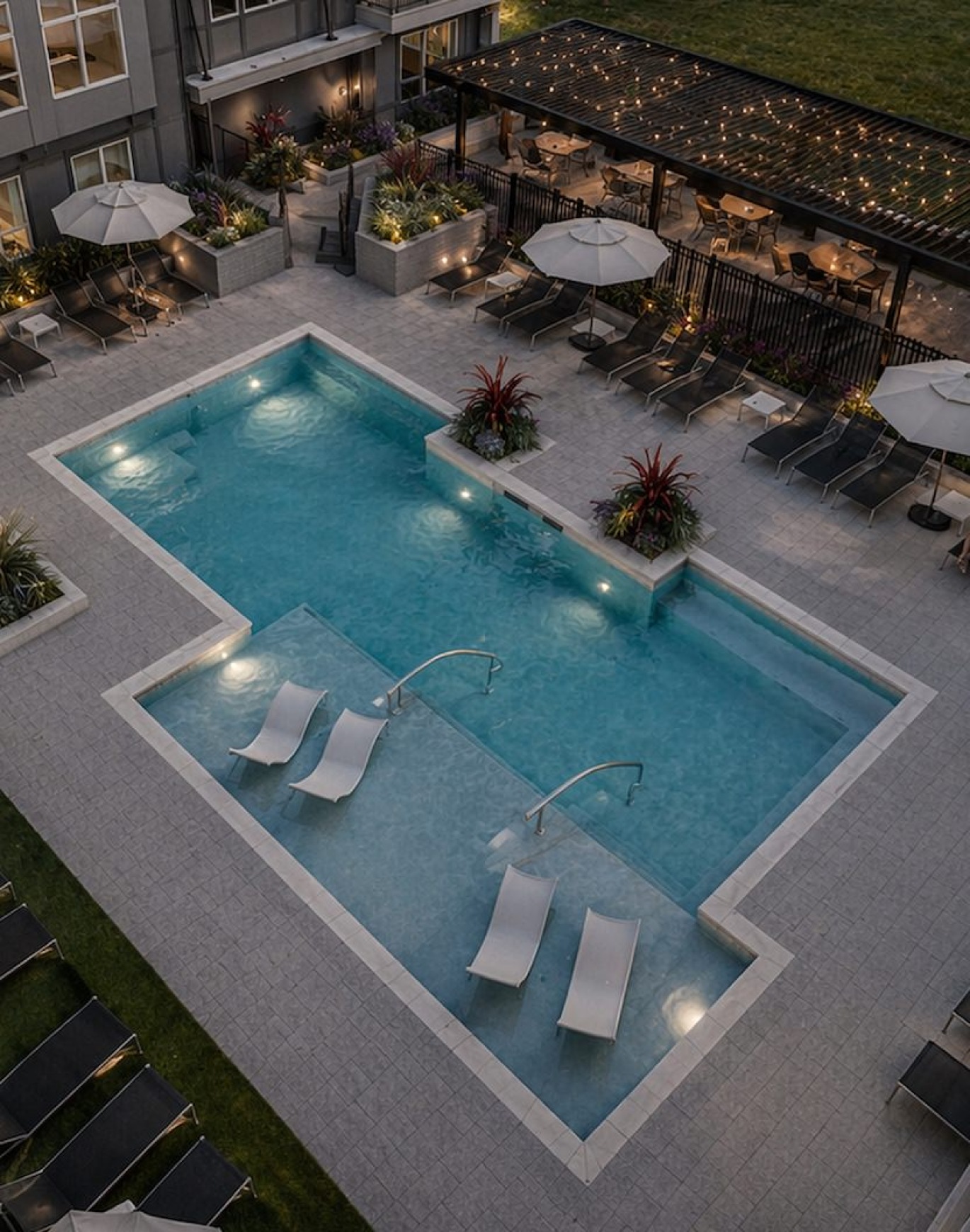 a pool with a building in the background