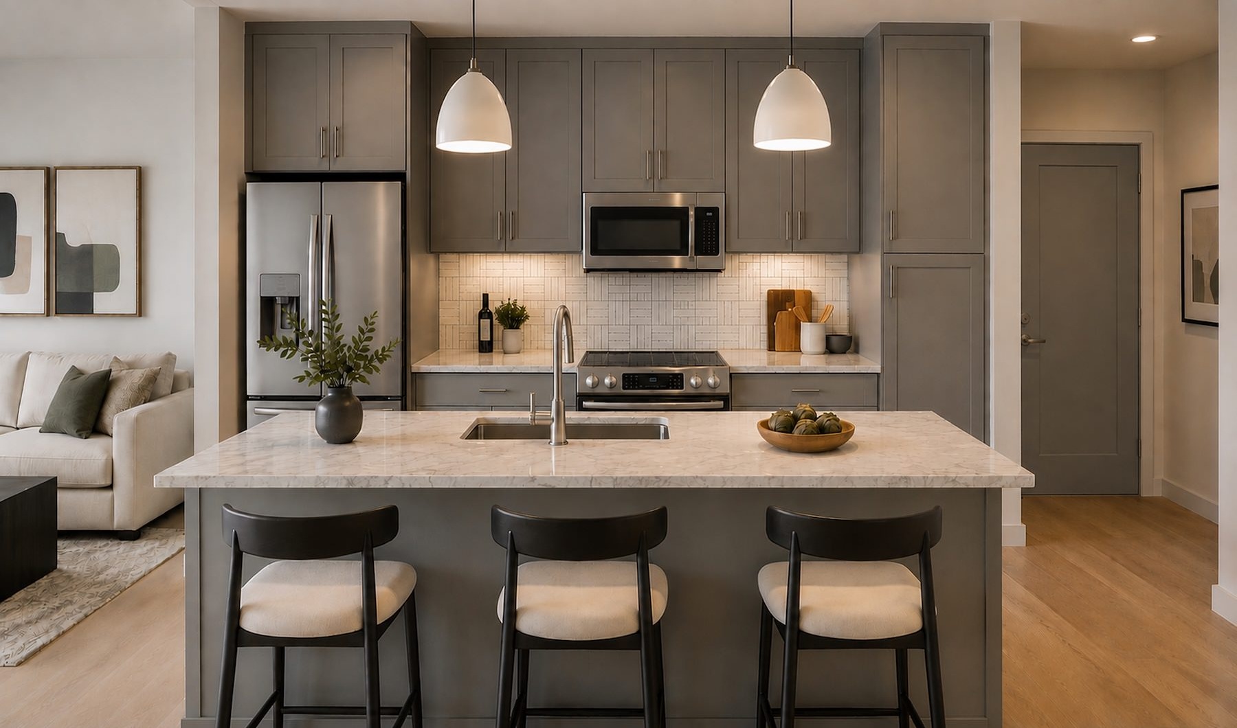 a kitchen with a marble island